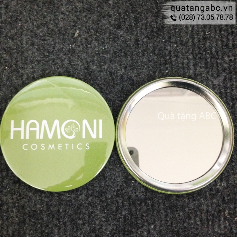 Logo cài áo hãng mỹ phẩm Hamoni Cosmetic đặt làm tại INLOGO.